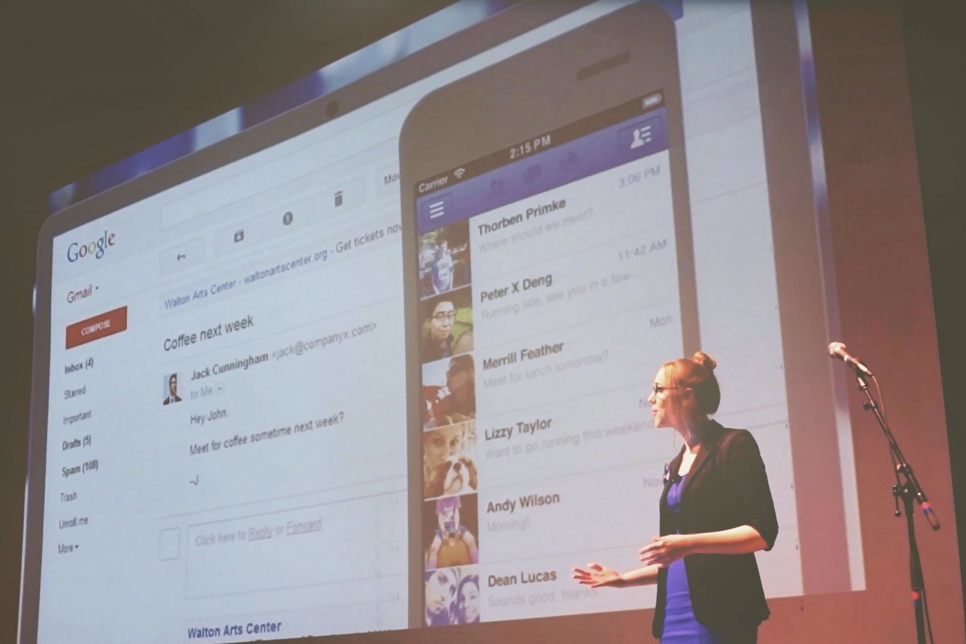 Ann presenting on stage in front of a large projected product demo